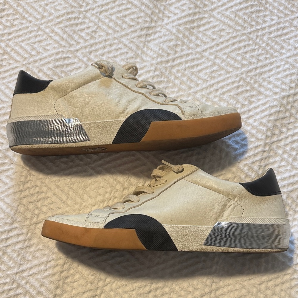Dolce Vita Cream Leather Sneakers with Black and Gum Sole Accents